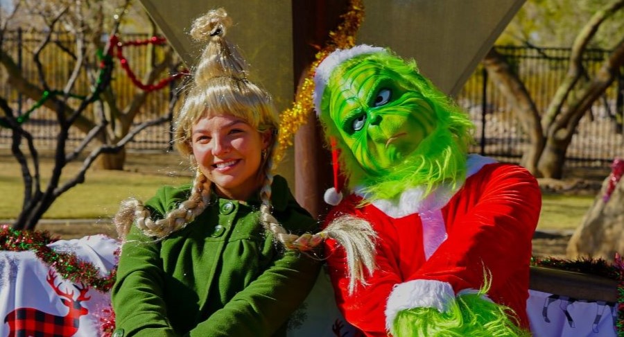 People dressed as Cindy-Lou Who and the Grinch